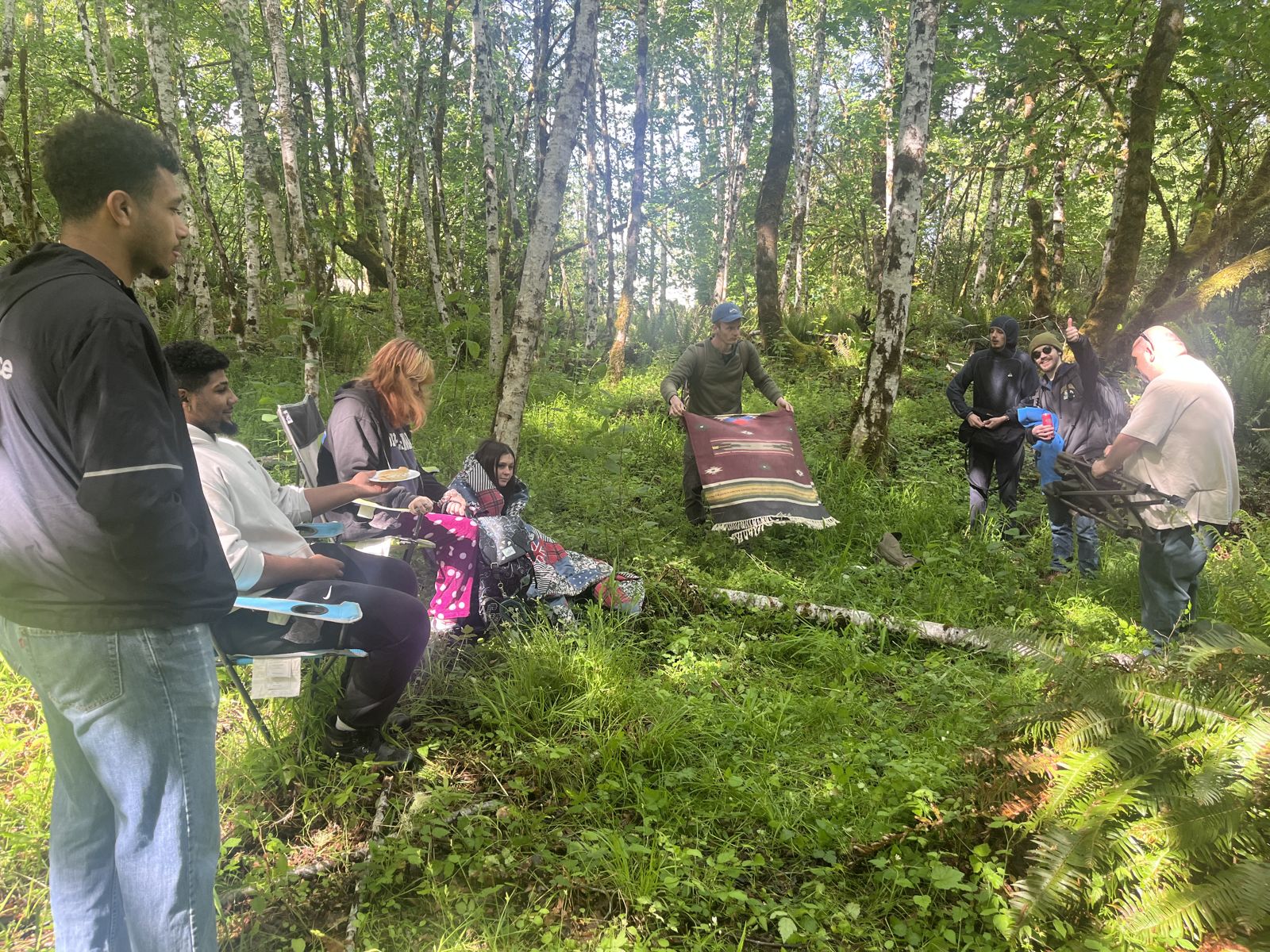 Changemakers in circle in the forest